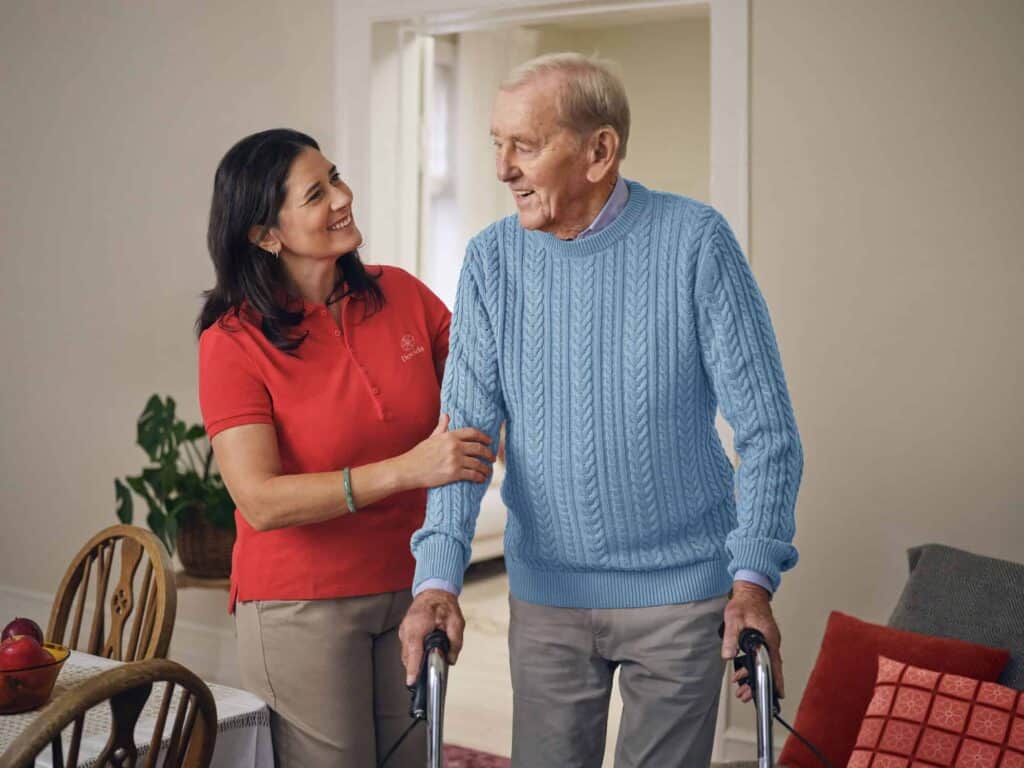 dovida-home-care-services-walking-together-elderly-care-scaled
